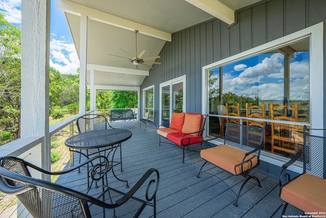 wooden deck with ceiling fan