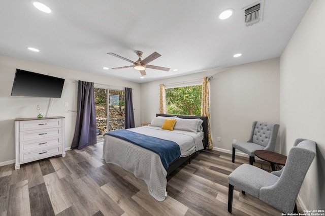 bedroom with ceiling fan and hardwood / wood-style floors