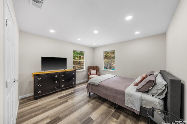 bedroom featuring hardwood / wood-style floors