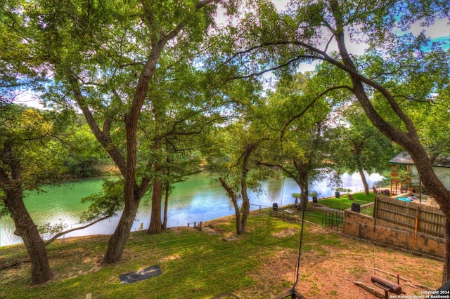 water view featuring fence