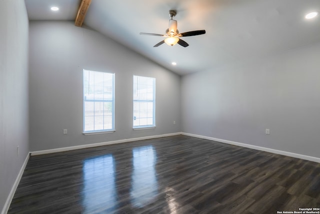 empty room featuring dark wood-type flooring, ceiling fan, and lofted ceiling with beams