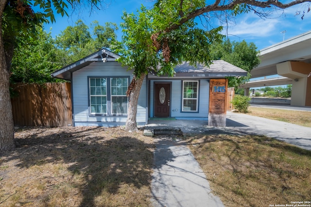 view of front of home featuring a carport