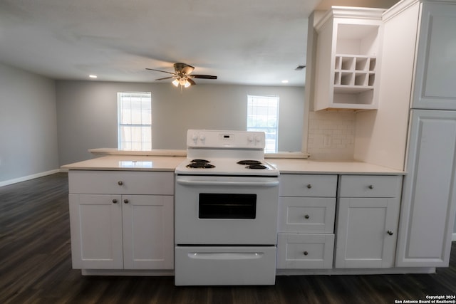 kitchen featuring dark wood-type flooring, ceiling fan, white range with electric stovetop, and a healthy amount of sunlight