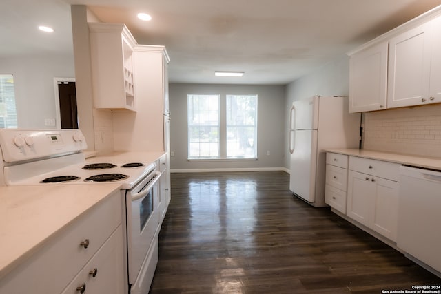 kitchen with white cabinets, white appliances, backsplash, and dark hardwood / wood-style flooring