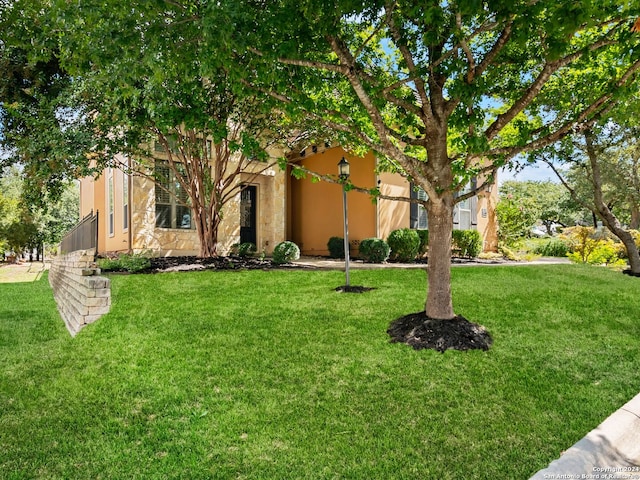 exterior space featuring a front lawn