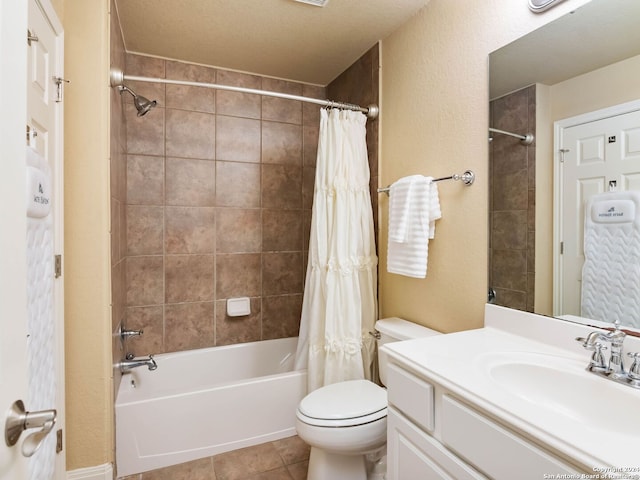 full bathroom with toilet, tile patterned floors, vanity, a textured ceiling, and shower / bath combination with curtain