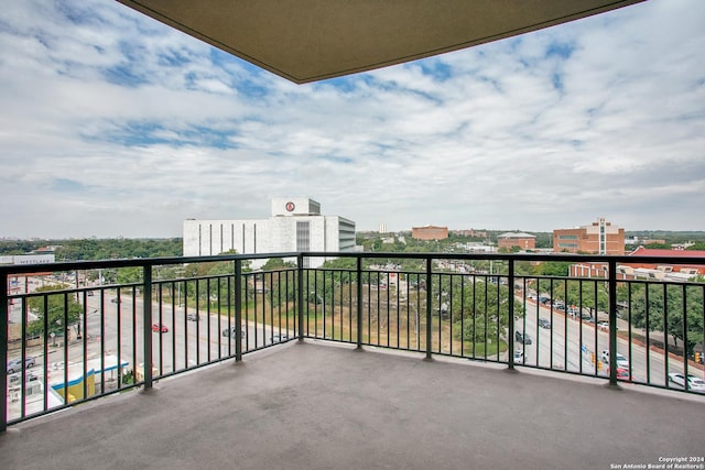 balcony featuring a city view