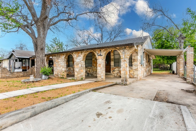 view of front of house with a carport