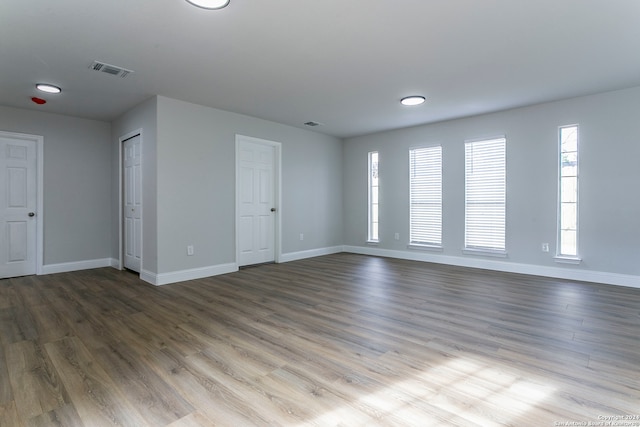 unfurnished living room with light hardwood / wood-style flooring