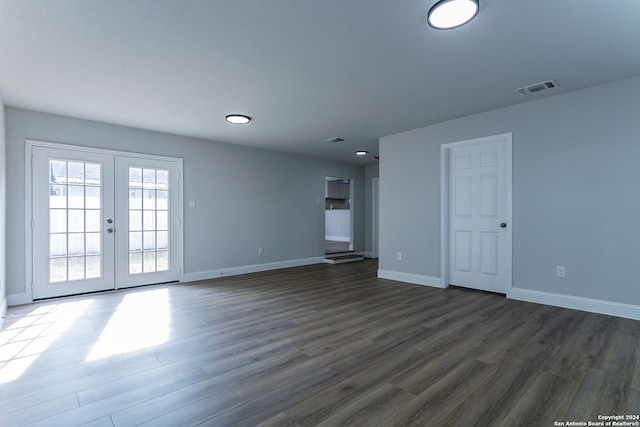 interior space with dark wood-type flooring and french doors