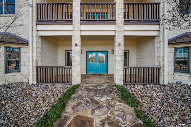 property entrance with a balcony