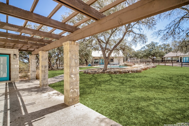 view of yard featuring a pergola and a patio area