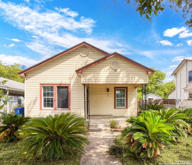 bungalow-style home with a porch