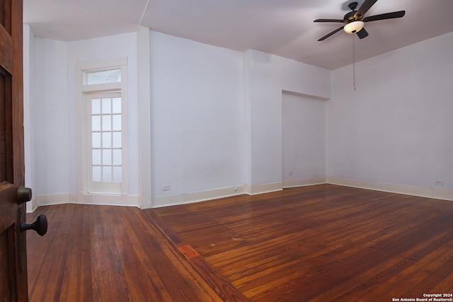 unfurnished room with hardwood / wood-style floors and ceiling fan