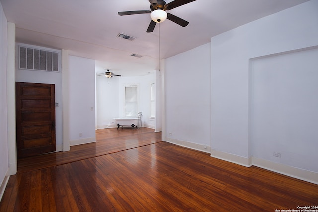 unfurnished living room with ceiling fan and hardwood / wood-style floors