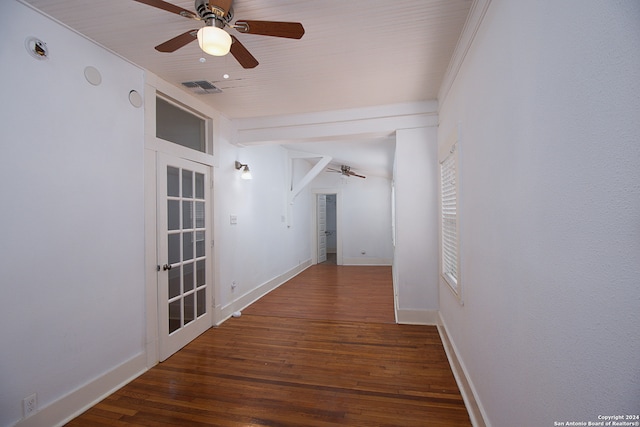 hall with ornamental molding and dark hardwood / wood-style floors