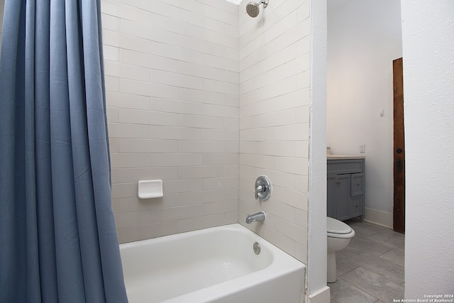 full bathroom featuring toilet, shower / tub combo, and vanity