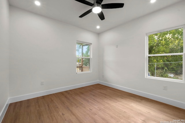 spare room featuring ceiling fan and wood-type flooring