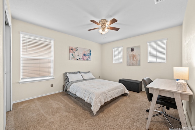 carpeted bedroom with ceiling fan