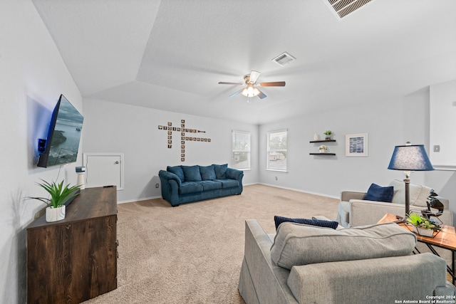 living room featuring light carpet and ceiling fan