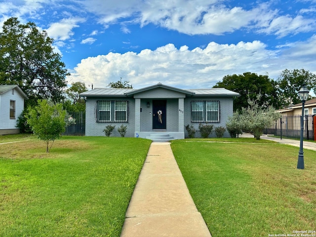 view of front of house with a front lawn