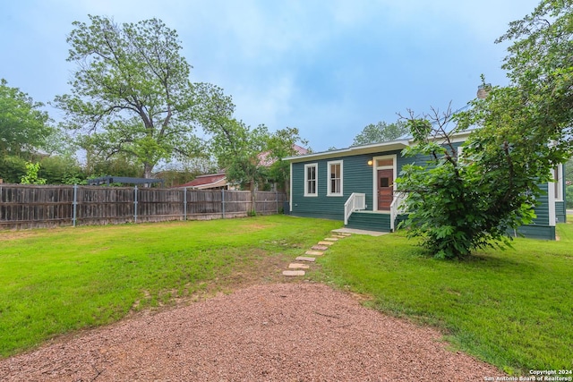 view of yard with fence