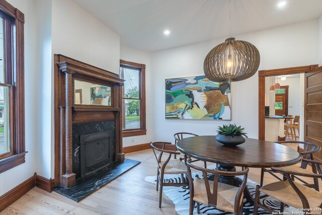 dining area with light hardwood / wood-style flooring