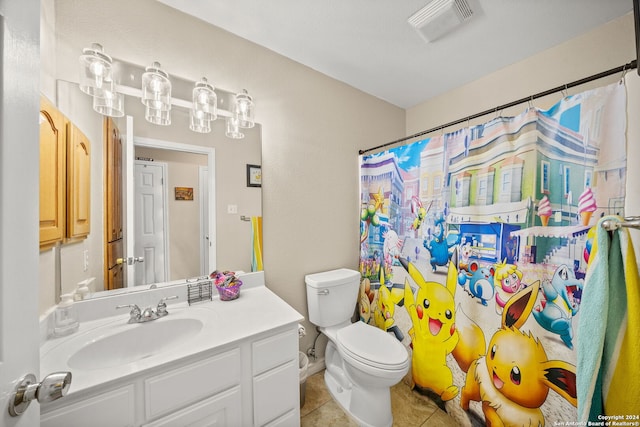 bathroom featuring a shower with shower curtain, tile patterned flooring, toilet, and vanity