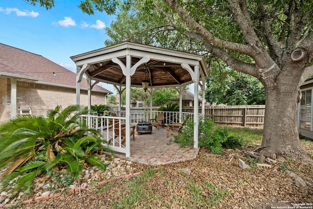 exterior space featuring a patio and a gazebo