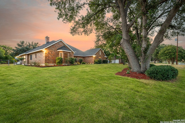 exterior space with a lawn