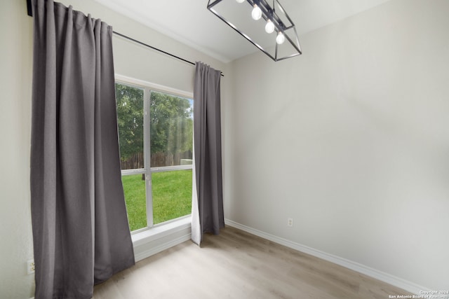 spare room with light wood-type flooring