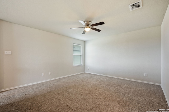 carpeted empty room with ceiling fan