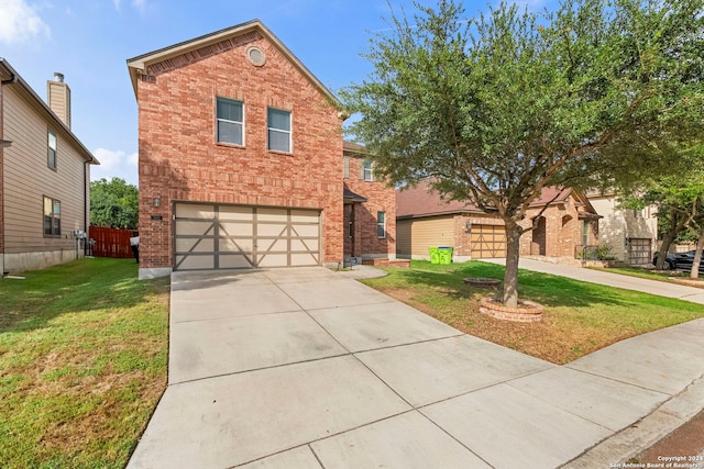 traditional-style home with an attached garage, a front yard, concrete driveway, and brick siding