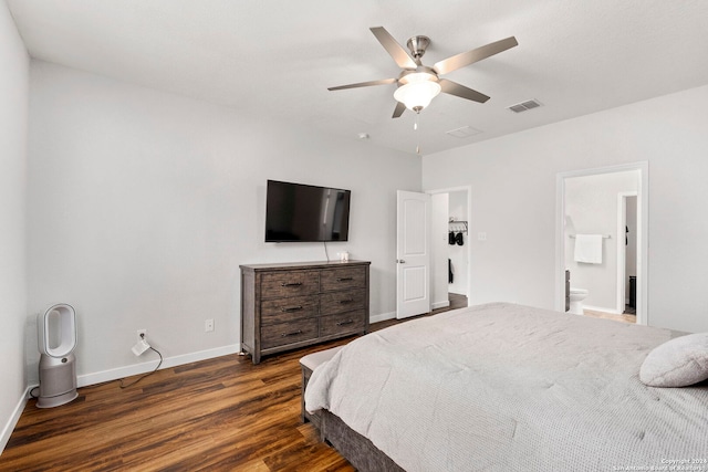 bedroom with ceiling fan, dark hardwood / wood-style floors, and ensuite bathroom