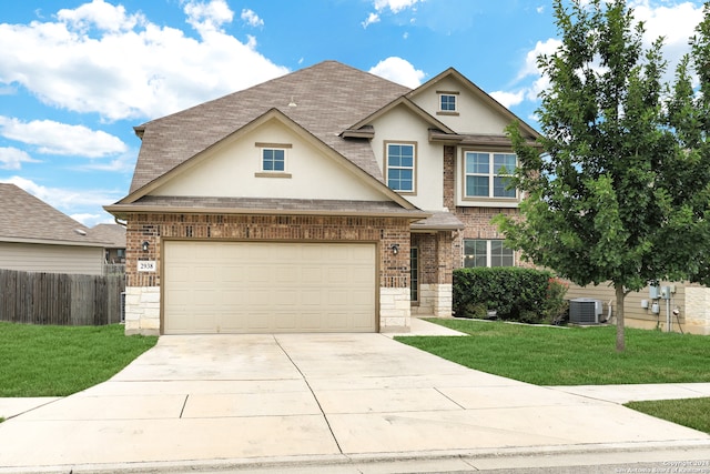 view of front of home featuring a front yard and central air condition unit