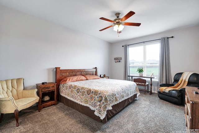 bedroom with ceiling fan and carpet