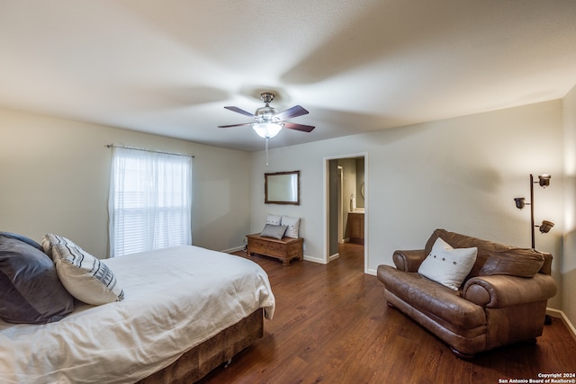 bedroom with ceiling fan, dark hardwood / wood-style flooring, and ensuite bath