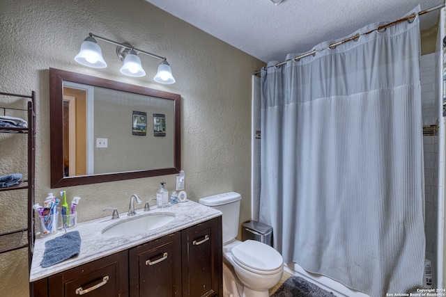 full bathroom with a textured ceiling, toilet, shower / bath combination with curtain, and vanity