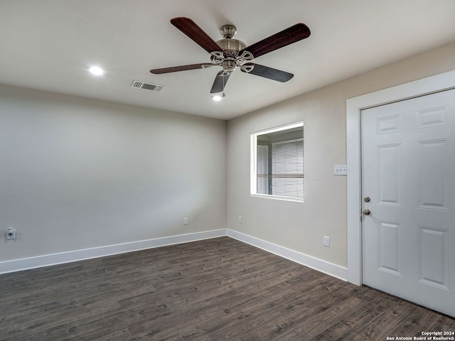 interior space featuring dark hardwood / wood-style floors and ceiling fan