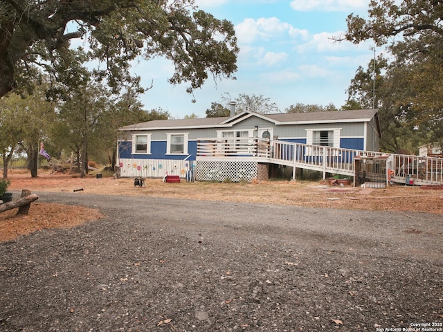 view of front of house featuring a deck