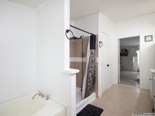 full bath with ornamental molding, tile patterned flooring, a shower stall, and a bath