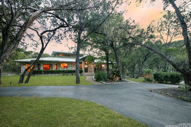 surrounding community featuring a lawn