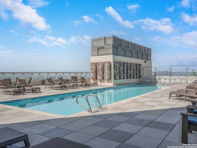 view of pool featuring a patio area