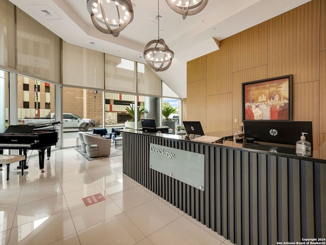 reception featuring a chandelier