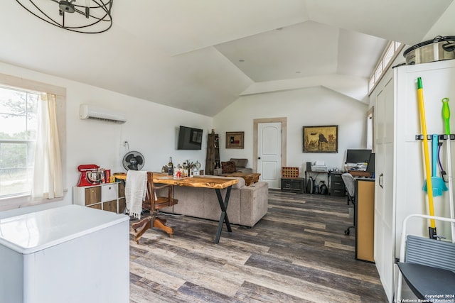 living room featuring dark hardwood / wood-style flooring, an AC wall unit, and lofted ceiling