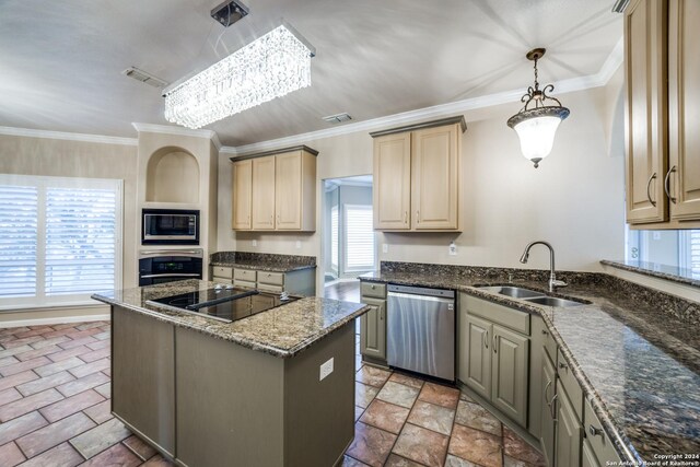 kitchen with hanging light fixtures, stainless steel appliances, ornamental molding, and sink