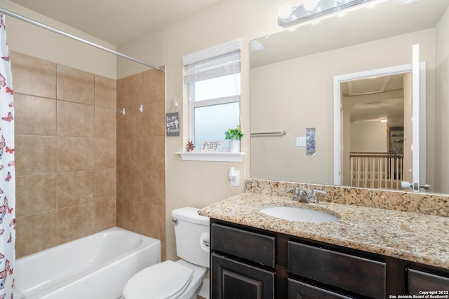 full bathroom featuring vanity, toilet, and shower / bath combo with shower curtain