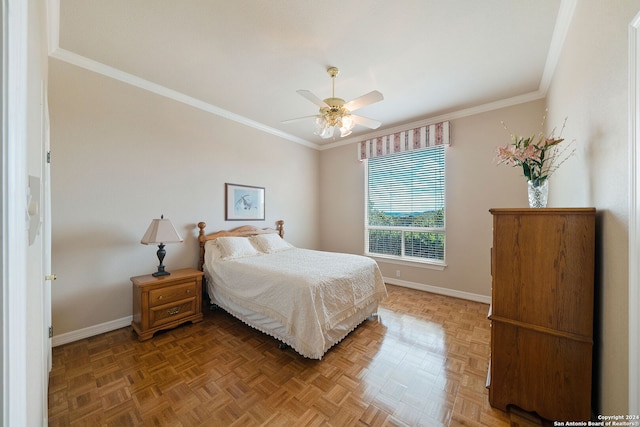 bedroom with parquet floors, ceiling fan, and ornamental molding