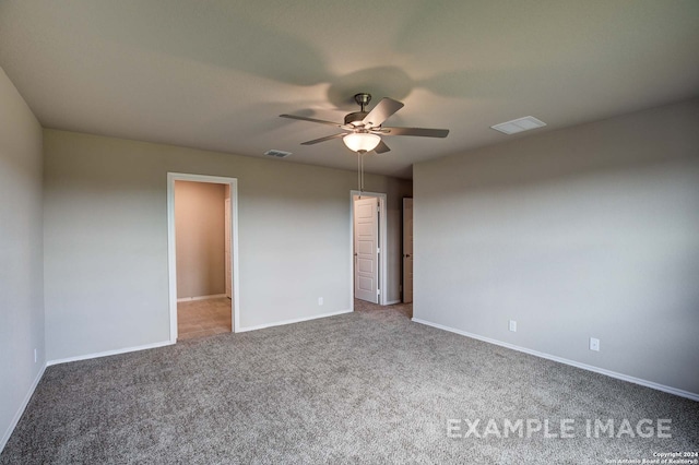 unfurnished bedroom featuring ceiling fan and carpet floors