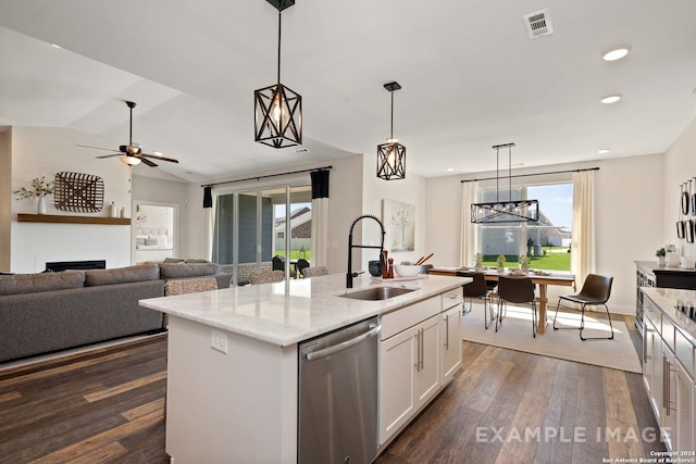 kitchen with dark hardwood / wood-style flooring, dishwasher, a kitchen island with sink, sink, and white cabinets